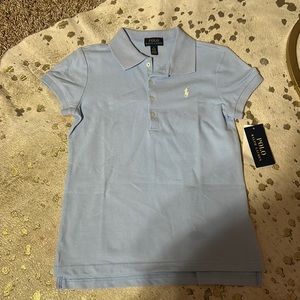 Polo baby blue size medium would best fit a 8-10